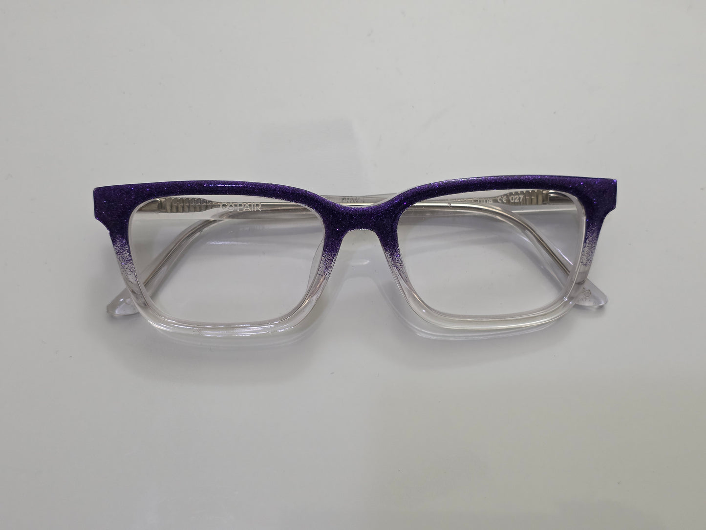 Dark purple glitter fade to clear